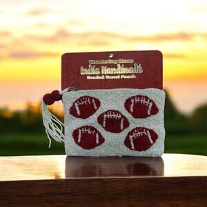 “Wandering Moon" handmade beaded travel pouch with a football design. New!